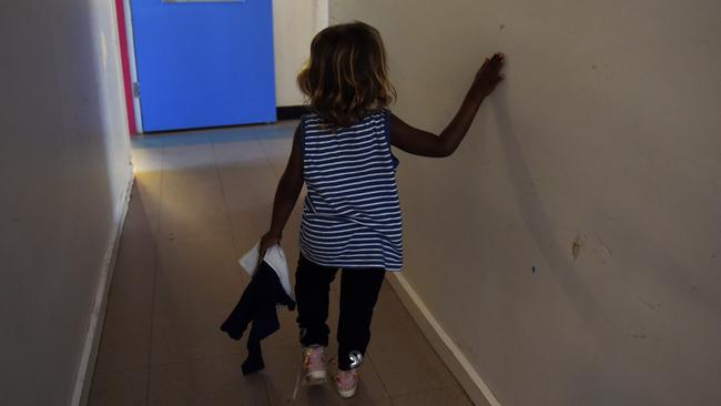 A child is seen at the Alice Springs Women's Shelter, Friday, May 27, 2016. The shelter, the only one in town, is in need for increased funding in order to cope with rising demand for its services by women and children affected by domestic violence. (AAP Image/Dan Peled) NO ARCHIVING