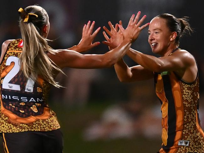 CAIRNS, AUSTRALIA - OCTOBER 24: Jasmine Fleming of the Hawks celebrates kicking a goal during the round nine AFLW match between Hawthorn Hawks and Narrm (Melbourne Demons) at Cazaly's Stadium, on October 24, 2024, in Cairns, Australia. (Photo by Albert Perez/AFL Photos via Getty Images)