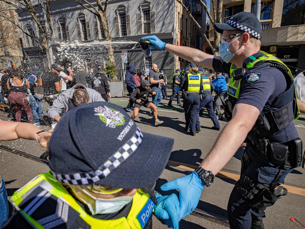 Police clash with anti-lockdown protesters in Melbourne CBD in August 2021. Picture: Jason Edwards