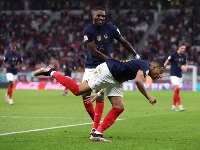 Kylian Mbappe of France celebrates with Marcus Thuram after scoring the team's third goal during the FIFA World Cup Qatar 2022 Round of 16 match between France and Poland. Picture: Francois Nel/Getty Images