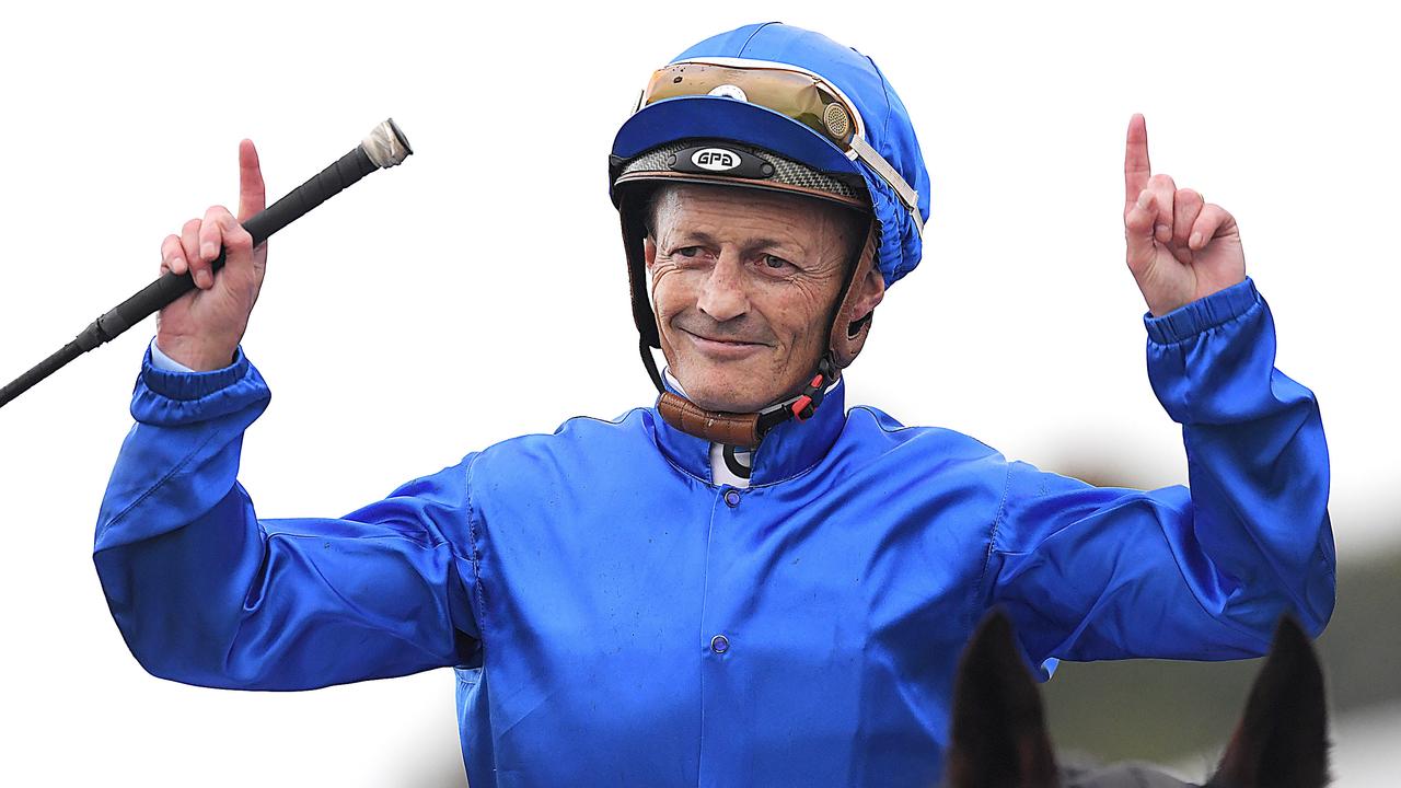 Jockey Damian Browne gestures after a victory aboard Impending in 2018. Picture: AAP