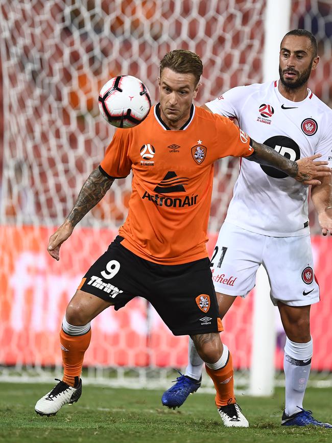 Adam Taggart of the Roar and Tarek Elrich of the Wanderers.