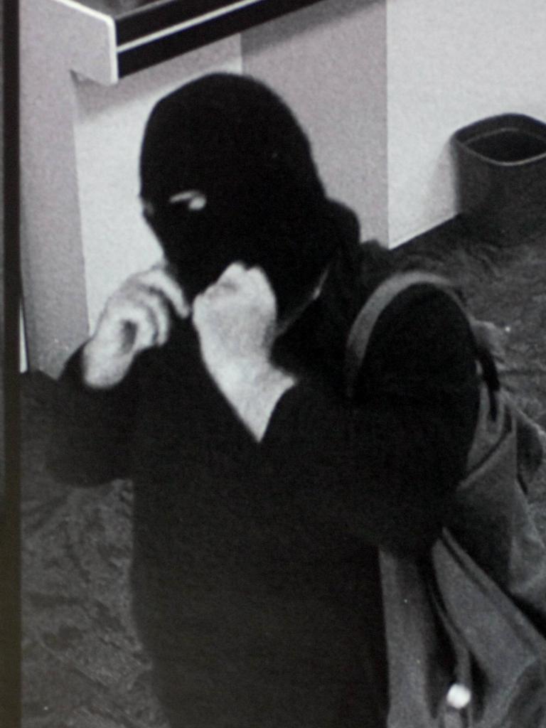 The notorious Adelaide Hills bank robbing Bicycle Bandit, wearing a balaclava.