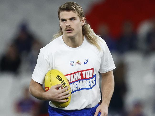 MELBOURNE, AUSTRALIA - AUGUST 20: Cody Weightman of the Bulldogs and Bailey Smith of the Bulldogs warm up before the round 23 AFL match between Western Bulldogs and West Coast Eagles at Marvel Stadium, on August 20, 2023, in Melbourne, Australia. (Photo by Daniel Pockett/Getty Images)