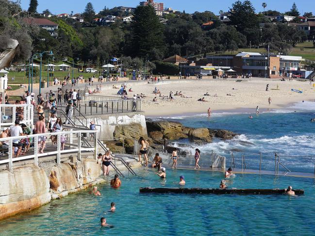 Crowds were already beginning to build at Bronte Beach on Monday morning. Picture: NCA Newswire/ Gaye Gerard