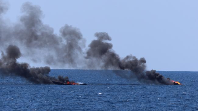 Imagery of two of the vessels being sunk in Australian waters.