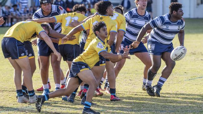 Ranil Shankar gets the ball away for Mabel Park. Picture: Nev Madsen.