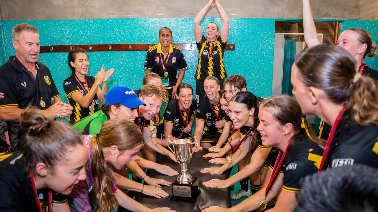 Mindil FC's WPL side celebrating their FNT Women's Challenge Cup victory. Picture: Daniel Abrantes.
