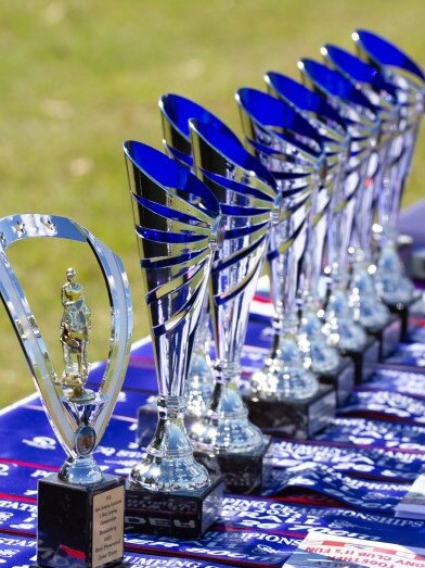 Ribbons and trophies ready for presentation at the 2023 PQC State Showjumping Championships.