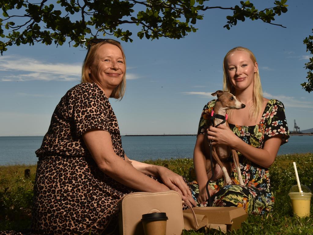 Townsville residents relaxing on the Strand after the relaxation of COVID-19 restrictions. Emma Anderson with daughter Katy Tucker with Lola from Idalia. Picture: Evan Morgan