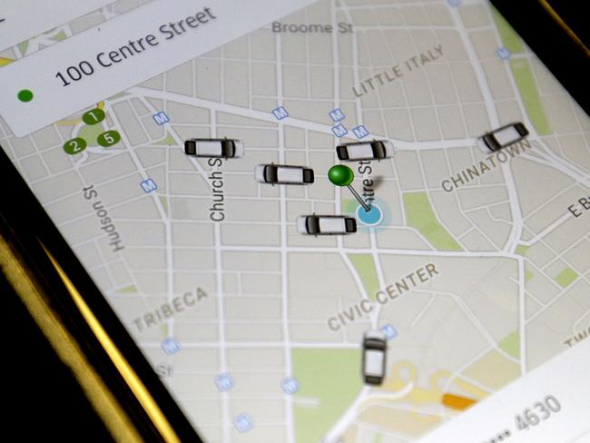 The Uber app tracks available rides via GPS technology. Picture: AP Photo/Mary Altaffer