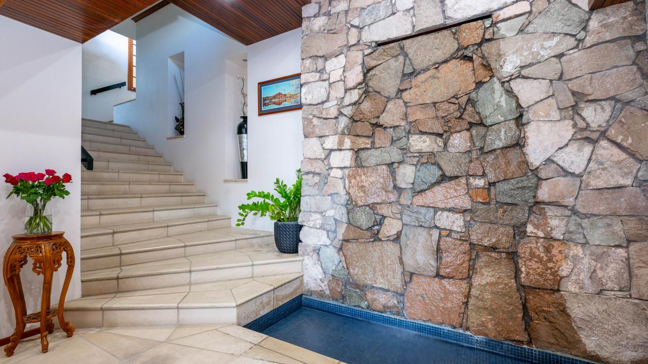 An indoor waterfall features in the entrance foyer. Picture: Supplied