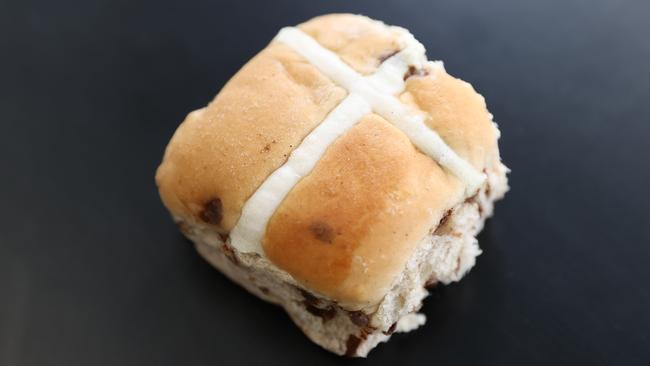 Woolworth’s apple and cinnamon hot cross bun. Picture: Tom Huntley