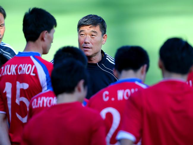 Coach Jo Tong Sop with players at Leichhardt Oval. Picture: Richard Dobson