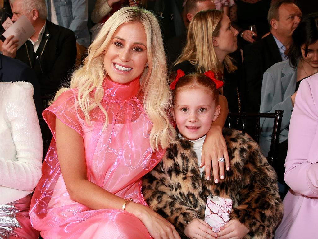 Roxy Jacenko and daughter Pixie Curtis in the front row of the Myer Spring/Summer launch at their Sydney City store. Pixie’s Bows are now stocked at Myer stores. Picture: Toby Zerna