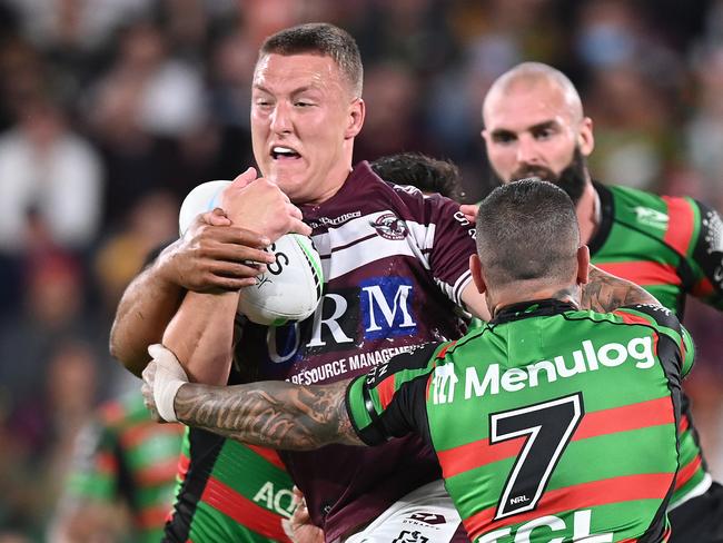 Manly’s Sean Keppie was only on the field for a few minutes before he was knocked out cold. (Photo by Bradley Kanaris/Getty Images)