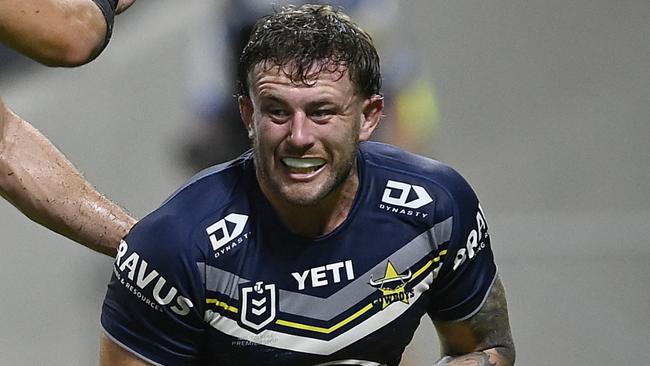 TOWNSVILLE, AUSTRALIA - MAY 04: Sam McIntyre of the Cowboys celebrates after scoring a try  during the round nine NRL match between North Queensland Cowboys and Dolphins at Qld Country Bank Stadium, on May 04, 2024, in Townsville, Australia. (Photo by Ian Hitchcock/Getty Images)