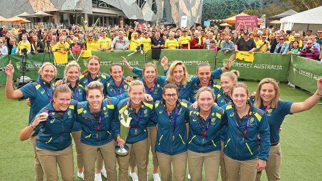 The Australian Women's T20 squad celebrate being world champions in Melbourne after winning the ICC World T20 in the West Indies. Picture: Scott Barbour/Getty Images