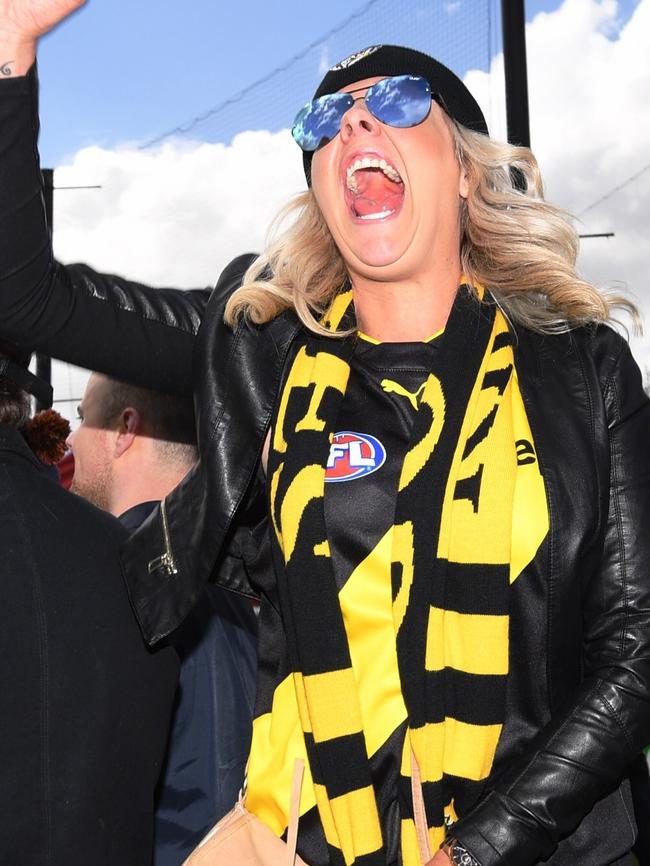 Tigers fans react to an early goal. Picture: AAP Image/Joe Castro