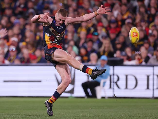 Reilly O'Brien kicks a goal against the Eagles in Round 11. Picture: James Elsby/AFL Photos via Getty Images.