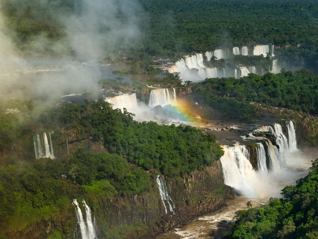 SEE IGUAZU FALLS, BRAZIL AND ARGENTINA See the world’s largest waterfall system in Iguazu Falls. Nearly 300 waterfalls running nearly 3km-long, a sight which attracts more than one million visitors every year. Don’t miss the largest of the falls, Devil’s Throat. While the falls can be visited year-round, avoid May, June, November and December when they’re most crowded.