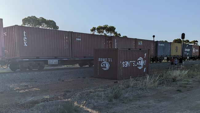 A carriage was seen tipped over beside the track. Picture: Jennifer Edwards