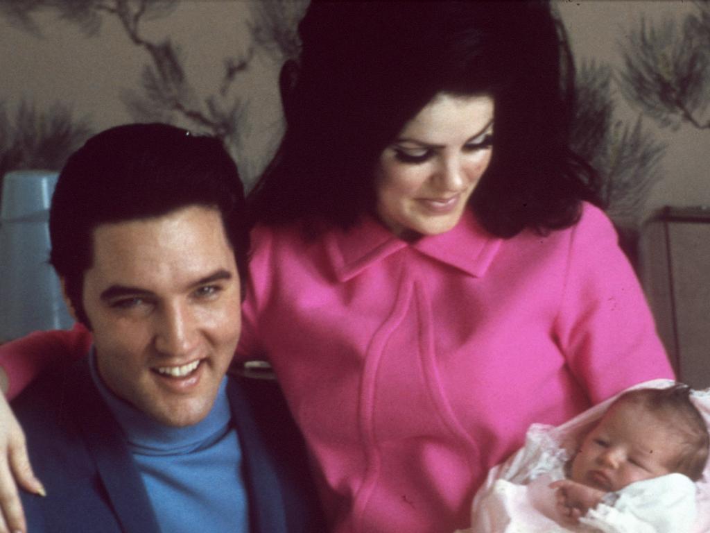 Elvis and Priscilla Presley and four day oldLisa Marie Presley.