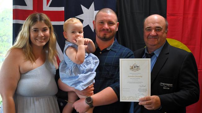 Hinchinbrook Mayor Ramon Jayo with new Aussie James Capstick, wife Tennille and baby Sophia at the Citizenship Ceremony at the Hinchinbrook Shire Library on Tuesday. Picture: Cameron Bates