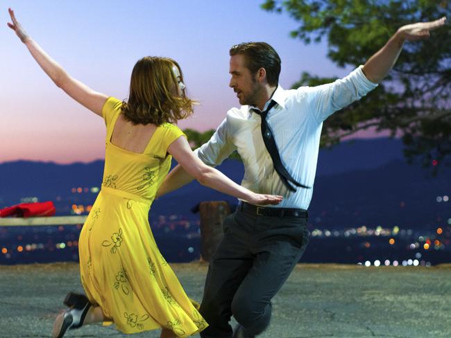 This image released by Lionsgate shows Ryan Gosling, right, and Emma Stone in a scene from, 