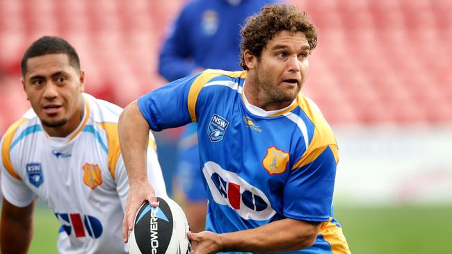 Beau Falloon offloads during City Origin training. Picture: Gregg Porteous