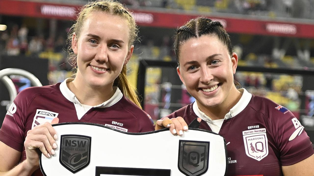 Tamika Upton and Romy Teitzel of the Maroons celebrate after winning the series during game two of the women's state of origin series between New South Wales Skyblues and Queensland Maroons at Queensland Country Bank Stadium on June 22, 2023 in Townsville, Australia. (Photo by Ian Hitchcock/Getty Images)