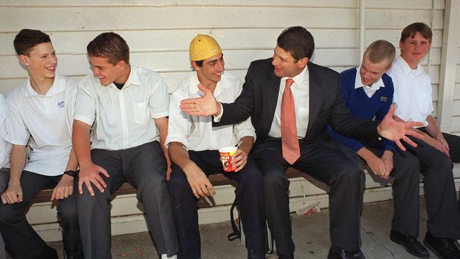 Premier Steve Bracks talks to students during their lunch break on their first day back in 2011.