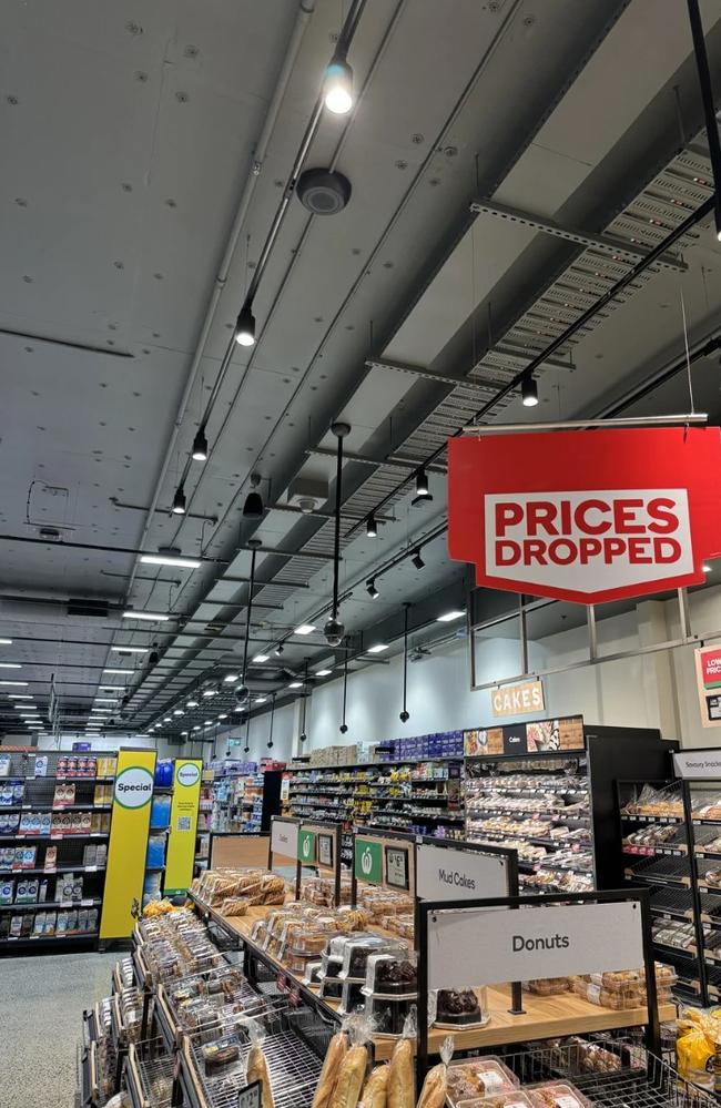 An image shared to Reddit showing multiple surveillance cameras in the bakery section of a Woolworths.