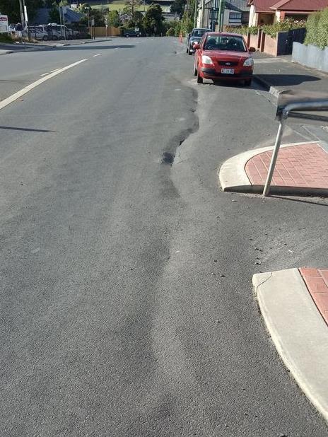 Scenes from a burst water incident at Burnette and Pioneer Streets in New Norfolk which has left some sections of road compromised. Source: MICHELLE DRACOULIS.