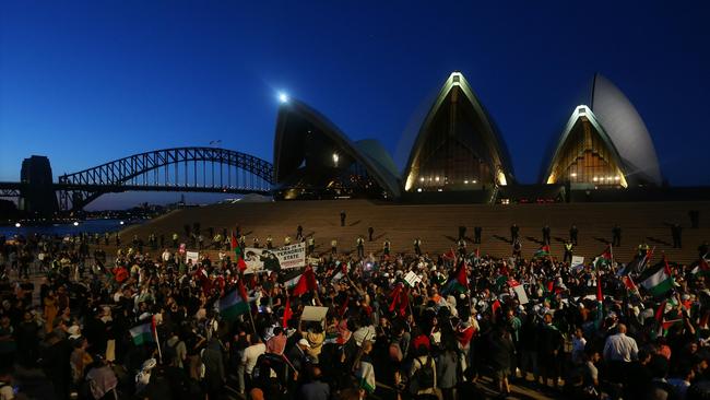 Palestine supporters rally outside the Sydney Opera House.