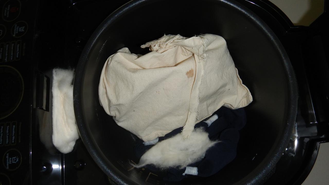 The reptiles were found in cloth bags, stuffed into the electrical compartments of the rice cookers Picture: Supplied