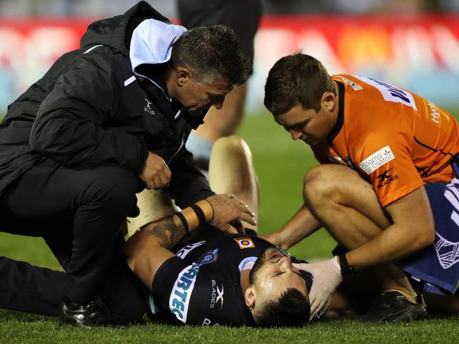 Cronulla's Jack Bird is treated for an injury. Picture: Brett Costello