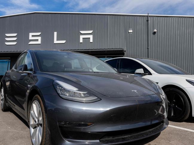 AUSTIN, TEXAS - JANUARY 03: Tesla cars are seen on a lot at a Tesla dealership on January 03, 2023 in Austin, Texas. Tesla's quarterly earnings fell short of Wall Street's expectations and its 2022 delivery target, losing approximately $675 billion in market valuation. CEO Elon Musk suggested that 2022's economic interest rates hurt vehicle demand.   Brandon Bell/Getty Images/AFP (Photo by Brandon Bell / GETTY IMAGES NORTH AMERICA / Getty Images via AFP)