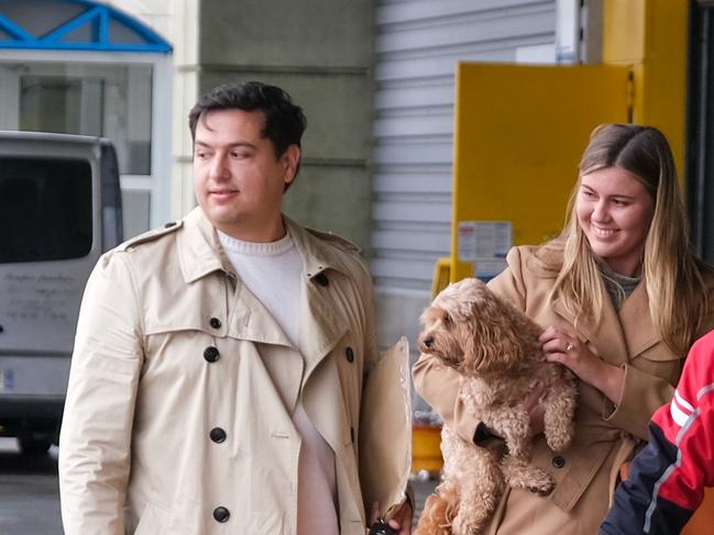 Brittany Higgins and David Sharaz cuddle their cavapoodle dog Kingston and carry their cat Clover in France. (Photo: Jacquelin Magnay)