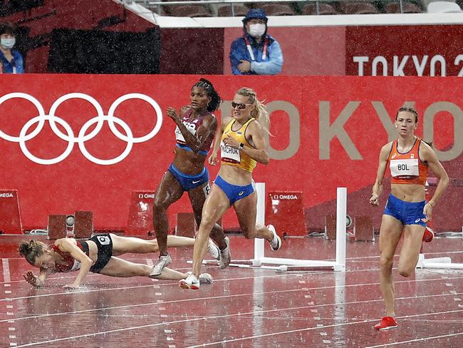 Sara Peterson from Denmark falls during the women’s 400m hurdles semi-final. Picture: Alex Coppel