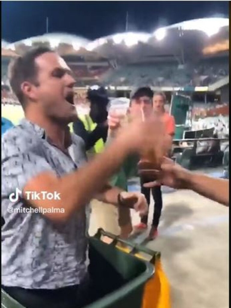 A man skols a drink at the Test at Adelaide Oval. Picture: Supplied