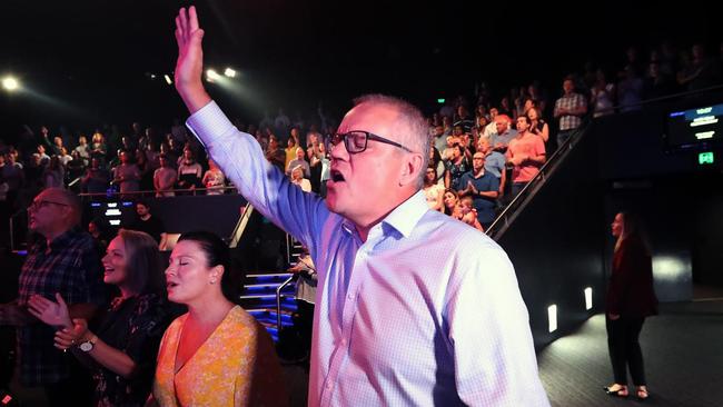 Scott Morrison in church. How dare he pray. 