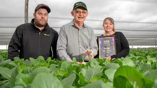 WORKING DAD: Crash victim Shaun Reina (left), pictured with Barden Produce's Clem Hodgman and Roslyn Pennings after their success at the 2018 Lockyer Valley Business Training & Apprenticeship Awards. Picture: Dominic Elsome