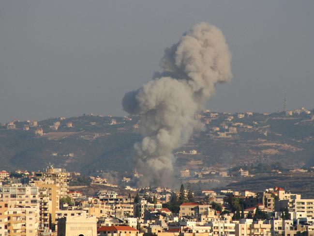 Smoke billows after an Israeli airstrike that targeted the southern Lebanese village of Abbasiyeh on September 24, 2024. Israel announced dozens of new air strikes on Hezbollah strongholds in Lebanon, a day after 558 people, including 50 children, were killed in the deadliest day of violence since the Lebanese civil war. (Photo by Kawnat HAJU / AFP)