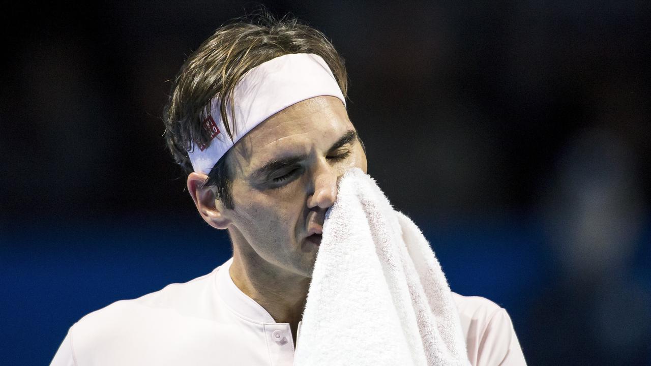 Roger Federer of Switzerland reacts during the quarter-final match against Gilles Simon of France at the Swiss Indoors tennis tournament at the St. Jakobshalle in Basel, Switzerland, on Friday, Oct. 26, 2018. (Alexandra Wey/Keystone via AP)