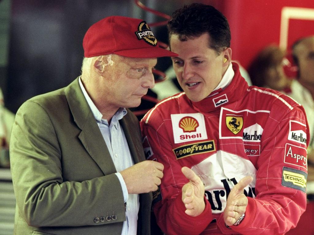 Legends Niki Lauder and Michael Schumacher.