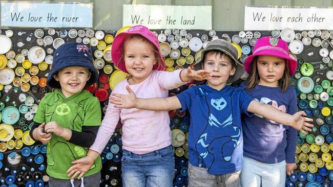 Eli Howell, Abby Ryan, George Micallef and Sophia Peterie give a wave at their day at Cubby House for Kids in Townsend. Picture: Adam Hourigan