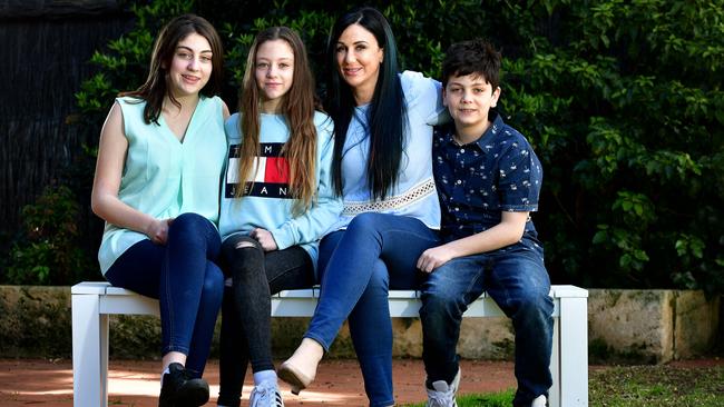 Andrea Eblen with her children Soraya, 15, and twins Electra and Harry, 12, are happy with their schooling decisions. Picture: Bianca De Marchi