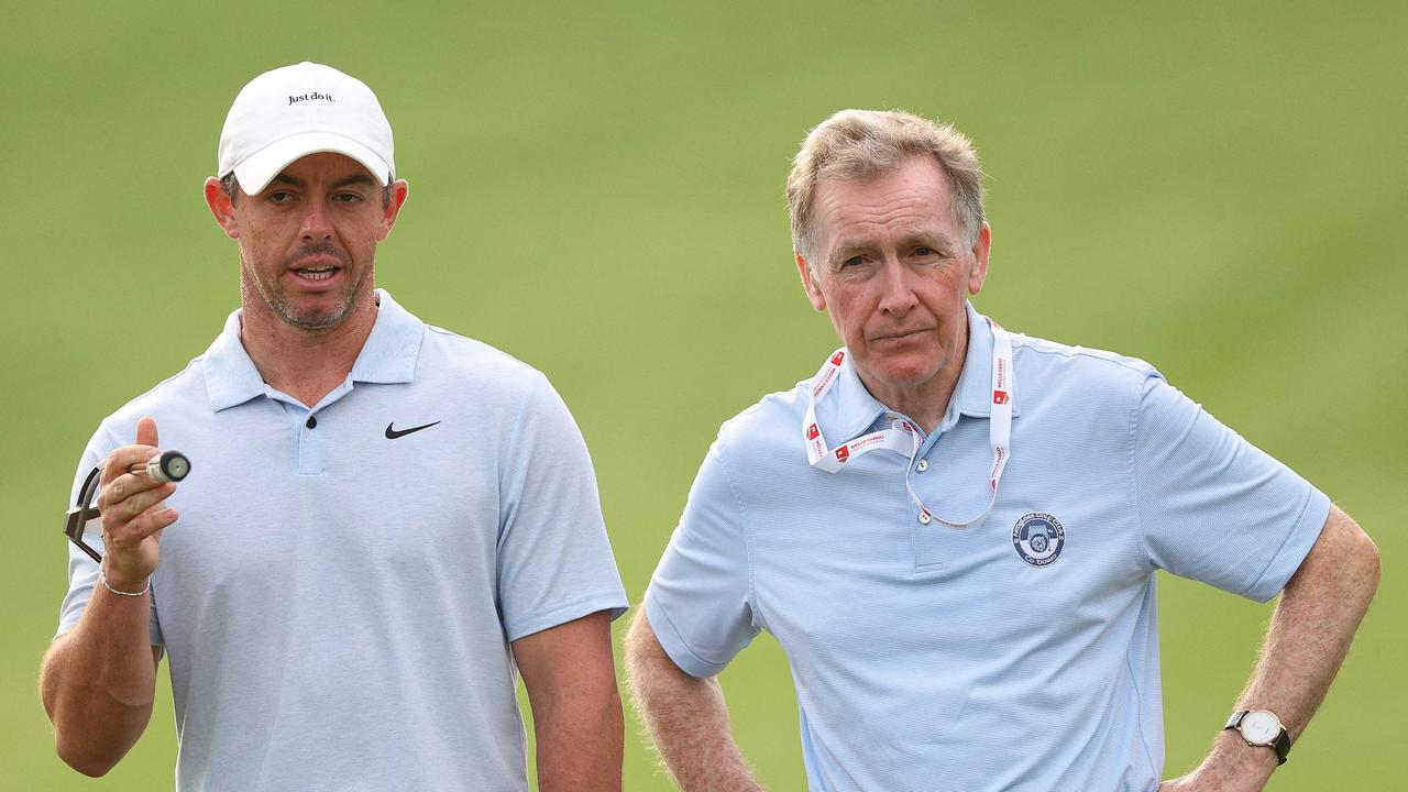 Rory McIlroy of Northern Ireland with his golf coach Michael Bannon.