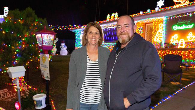 Kerrie and Matt Sheers in front of their home on Nice Place, Seven Hills, NSW. Friday 7th December 2018. The residents have elaborate Christmas lights and raise money for the children's hospital. (AAP IMAGE/Jordan Shields)